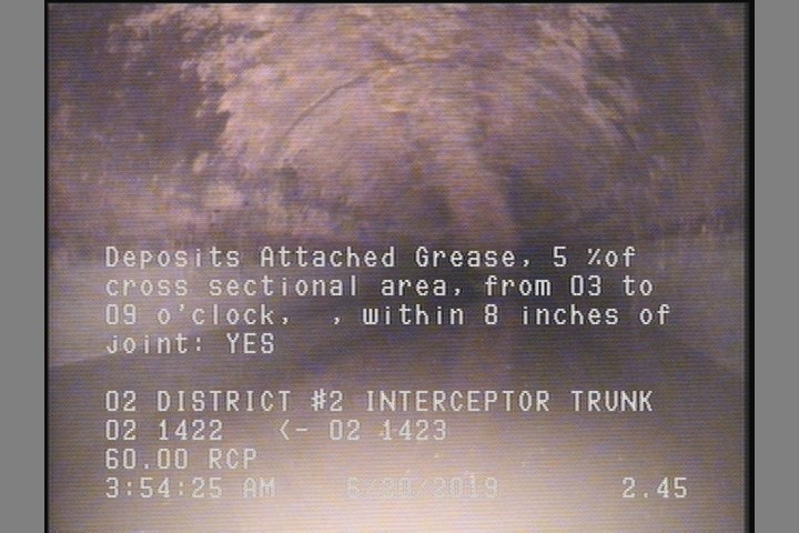 Deposits Attached Grease, 5 %of cross sectional area, from 03 to 09 o'clock, , within 8 inches of joint: YES
