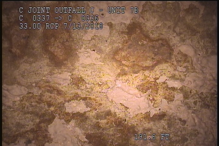 Surface Spalling, from 09 to 03 o'clock, within 8 inches of joint: NO - BLISTERING PEELING CONCRETE UNDER MAG COAT