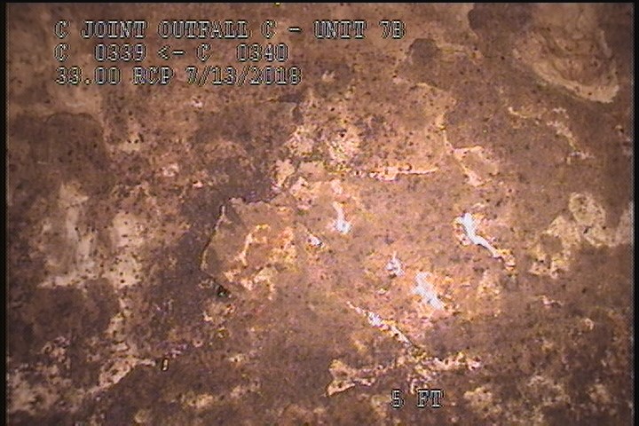 Surface Spalling, from 09 to 03 o'clock, within 8 inches of joint: YES, Start - BLISTERING PEELING CONCRETE UNDER MAG COAT