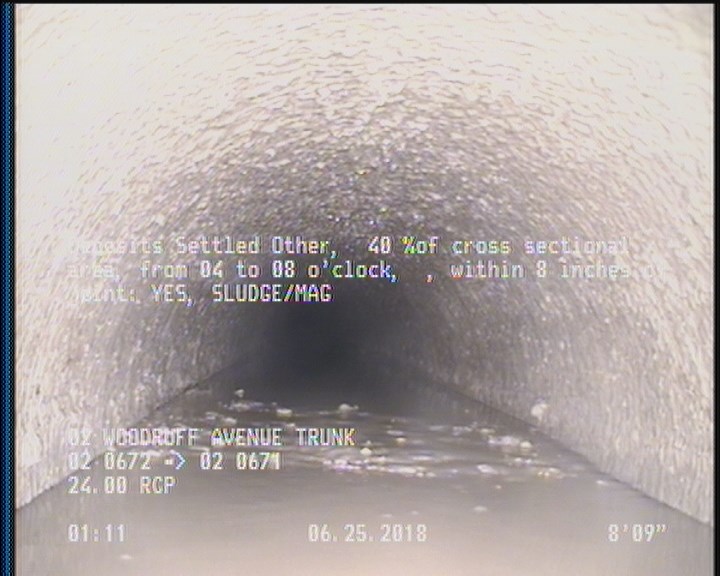 Deposits Settled Other, 40 %of cross sectional area, from 04 to 08 o'clock, , within 8 inches of joint: YES - SLUDGE/MAG