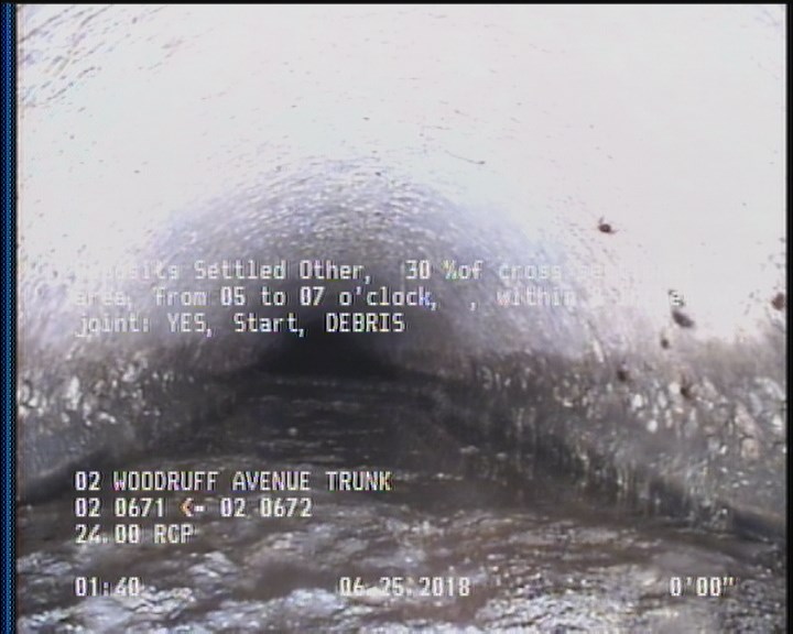 Deposits Settled Other, 30 %of cross sectional area, from 05 to 07 o'clock, , within 8 inches of joint: YES, Start - DEBRIS