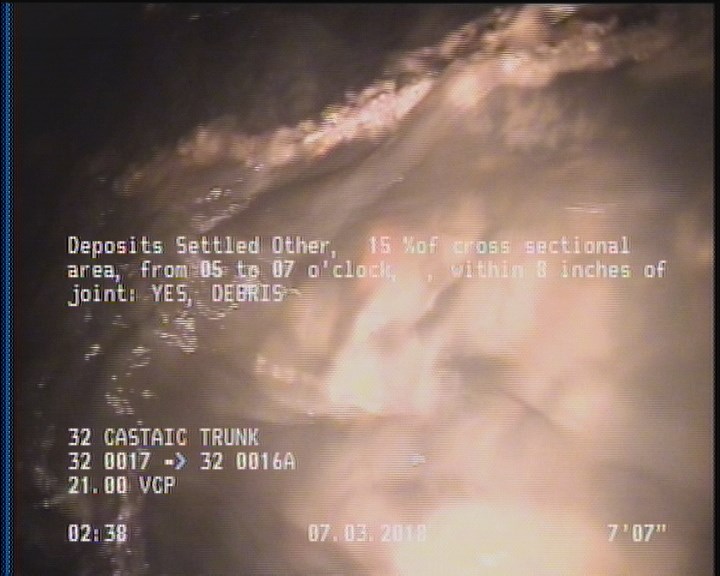 Deposits Settled Other, 15 %of cross sectional area, from 05 to 07 o'clock, , within 8 inches of joint: YES, Start - DEBRIS