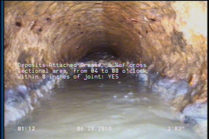 Deposits Attached Grease, 5 %of cross sectional area, from 04 to 08 o'clock, , within 8 inches of joint: YES