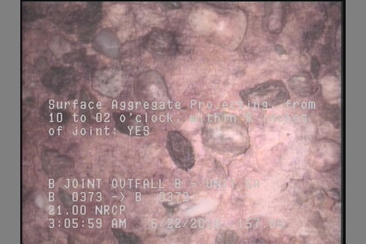 Surface Aggregate Projecting, from 10 to 02 o'clock, within 8 inches of joint: YES