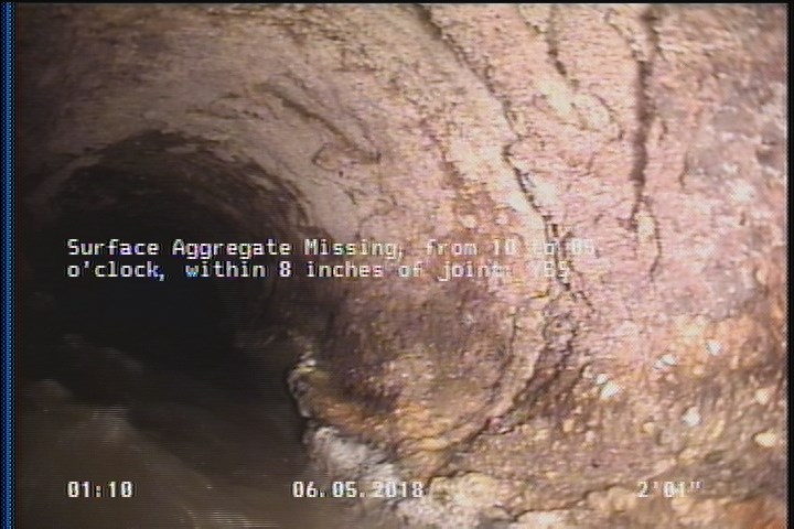 Surface Aggregate Missing, from 10 to 05 o'clock, within 8 inches of joint: YES