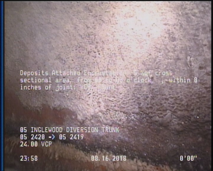 Deposits Attached Encrustation, 5 %of cross sectional area, from 09 to 03 o'clock, , within 8 inches of joint: YES, Start