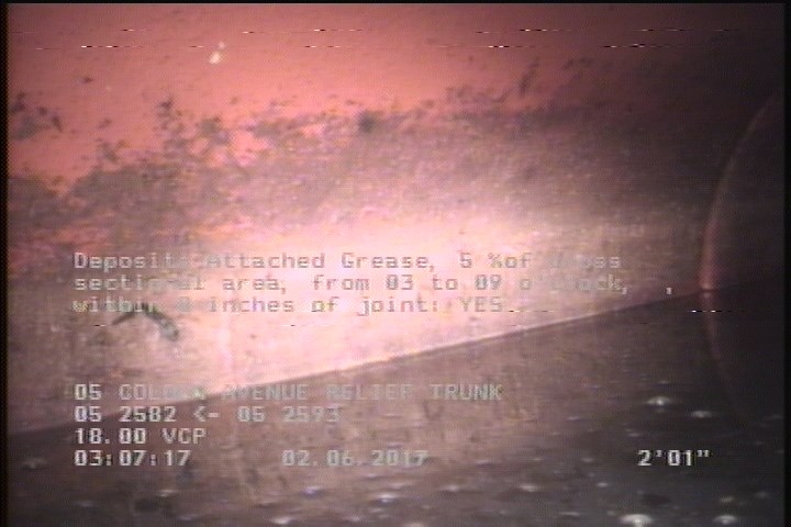 Deposits Attached Grease, 5 %of cross sectional area, from 03 to 09 o'clock, , within 8 inches of joint: YES