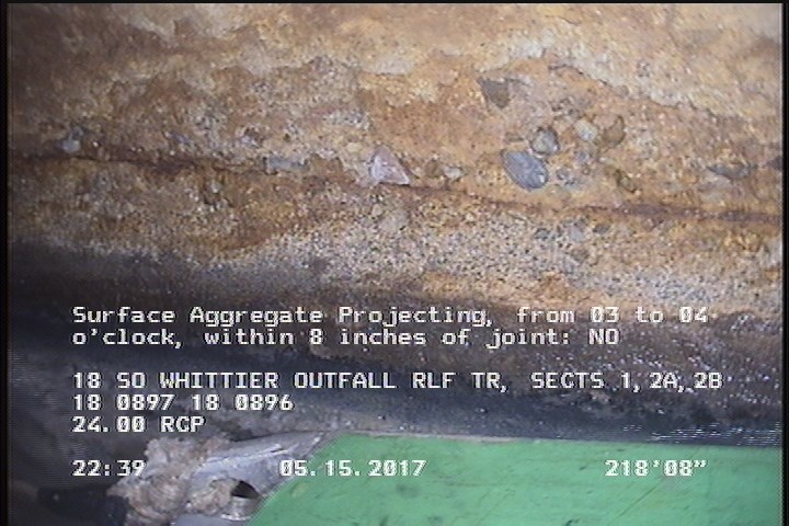 Surface Aggregate Projecting, from 03 to 04 o'clock, within 8 inches of joint: NO