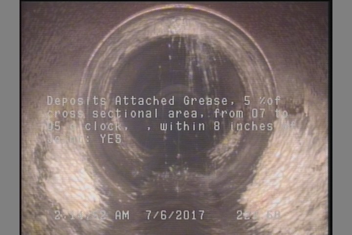 Deposits Attached Grease, 5 %of cross sectional area, from 07 to 05 o'clock, , within 8 inches of joint: YES