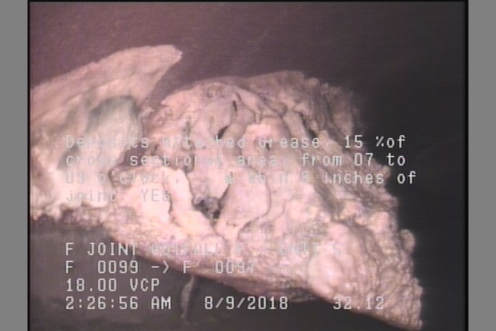 Deposits Attached Grease, 15 %of cross sectional area, from 07 to 09 o'clock, , within 8 inches of joint: YES