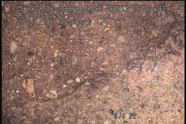 Surface Spalling, from 09 to 03 o'clock, within 8 inches of joint: NO - PEELING CONCRETE MODERATE AGG ATTACHED