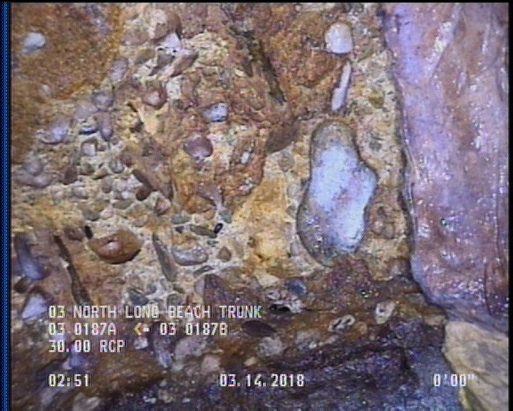 Surface Aggregate Projecting, from 09 to 03 o'clock, within 8 inches of joint: YES