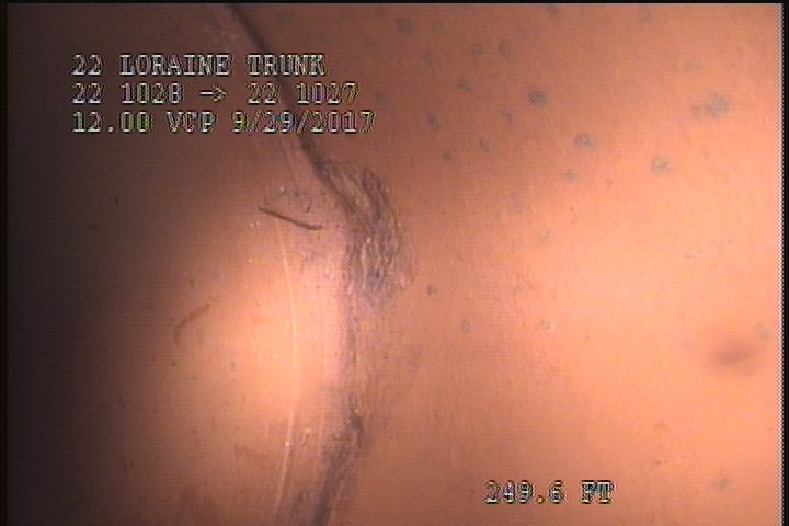 Surface Spalling, from 01 to 02 o'clock, within 8 inches of joint: YES