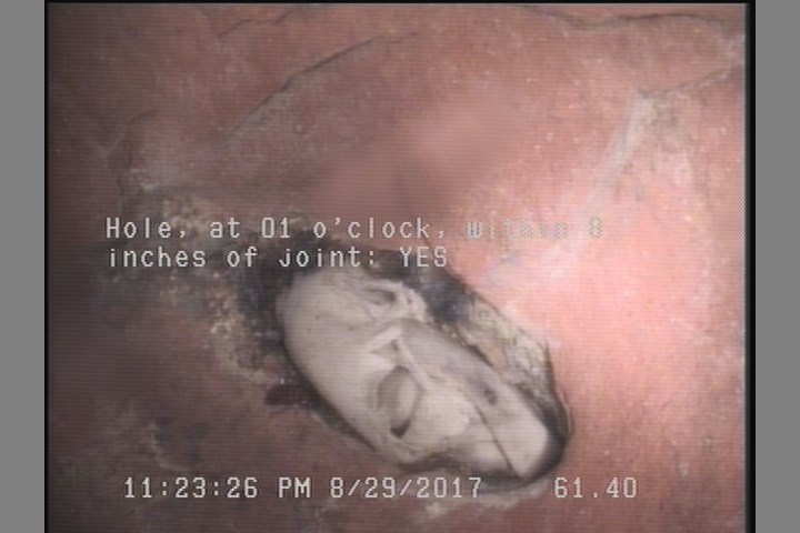 Hole, at 01 o'clock, within 8 inches of joint: YES - CRACKS AROUND THE HOLE