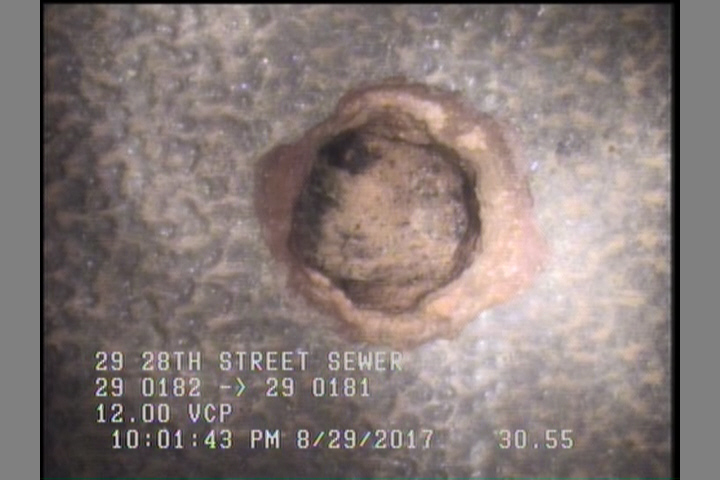 Hole, at 11 o'clock, within 8 inches of joint: NO - SMALL HOLE