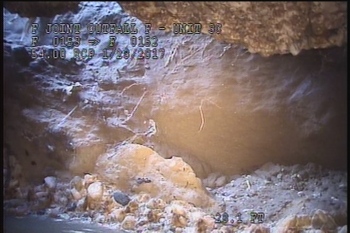 General Photograph - MISSING WALL WITH SOIL VISIBLE