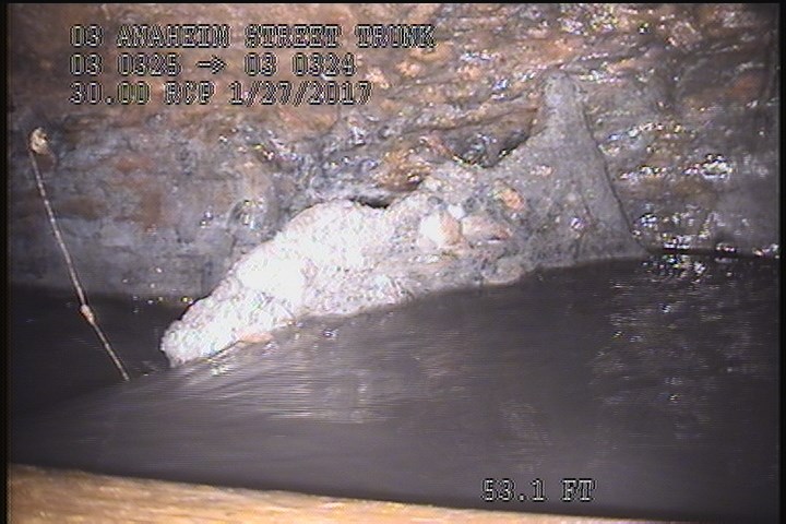 Deposits Settled Other, 15 %of cross sectional area, from 03 to 06 o'clock, , within 8 inches of joint: YES - PIECE OFF PIPE WALL