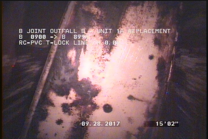 Downstream Manhole, Survey Ends - 6:00AM ( CONCRETE SLAB )