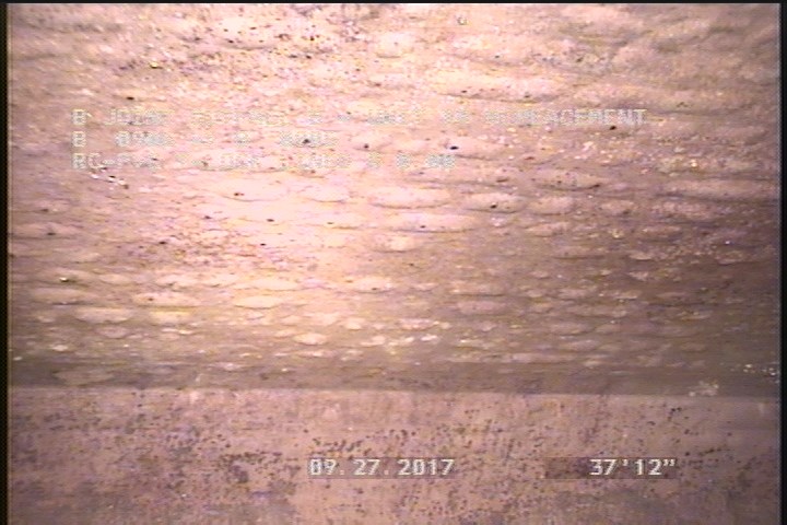 Lining Failure Blistered, from 10 to 02 o'clock, within 8 inches of joint: NO - SMALL