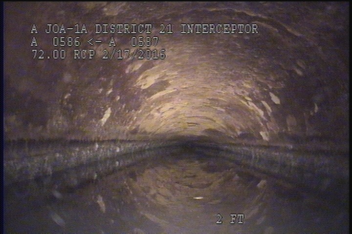 Downstream Manhole, Survey Begins - 9:22 AM