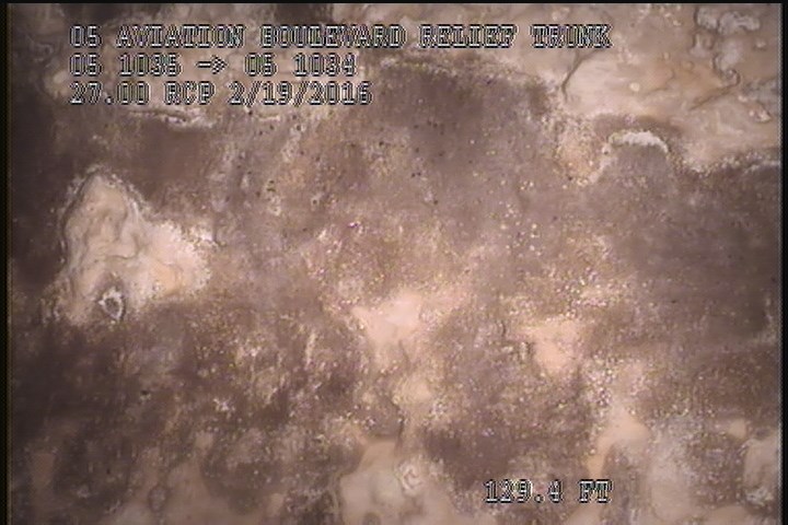 Surface Spalling, from 08 to 04 o'clock, within 8 inches of joint: YES - SWOLLEN LAITANCE COAT UNDER MAG COAT