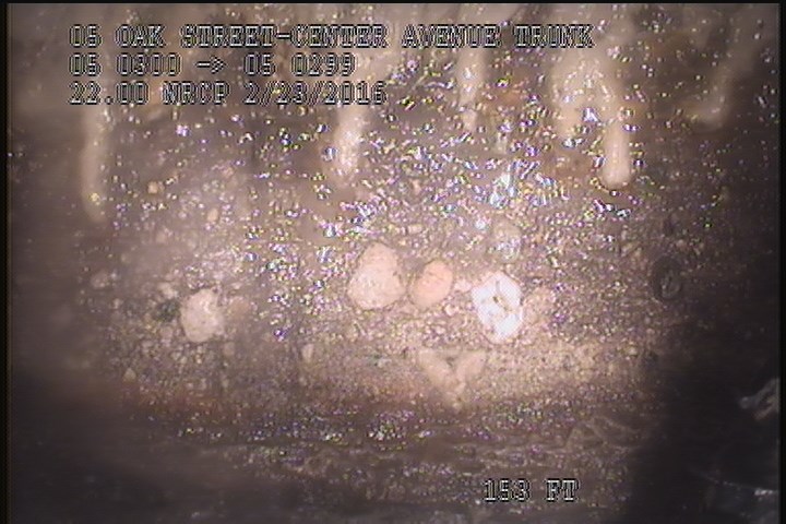 Surface Aggregate Projecting, from 03 to 04 o'clock, within 8 inches of joint: NO - SEVERE AGG