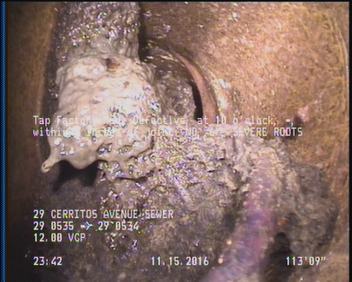 Tap Factory Made Defective, at 10 o'clock, -, within 8 inches of joint: NO, 6" - SEVERE ROOTS