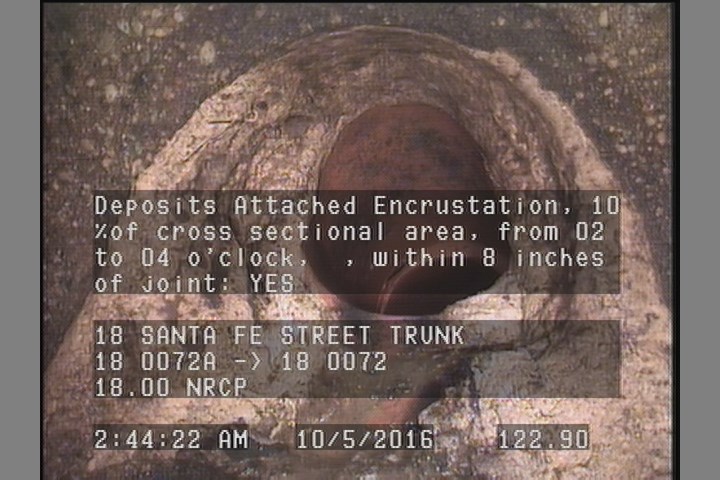 Deposits Attached Encrustation, 10 %of cross sectional area, from 02 to 04 o'clock, , within 8 inches of joint: YES
