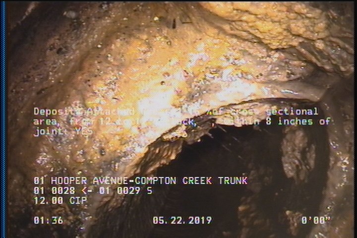 Deposits Attached Grease, 15 %of cross sectional area, from 12 to 12 o'clock, , within 8 inches of joint: YES