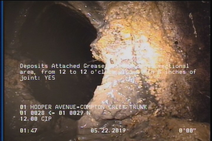 Deposits Attached Grease, 15 %of cross sectional area, from 12 to 12 o'clock, , within 8 inches of joint: YES