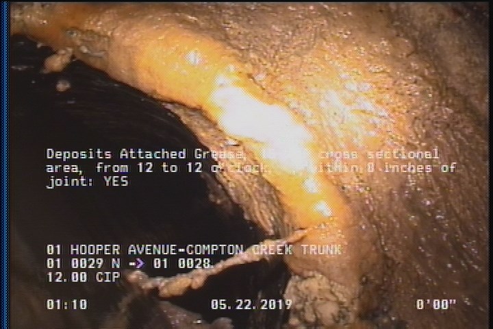 Deposits Attached Grease, 15 %of cross sectional area, from 12 to 12 o'clock, , within 8 inches of joint: YES