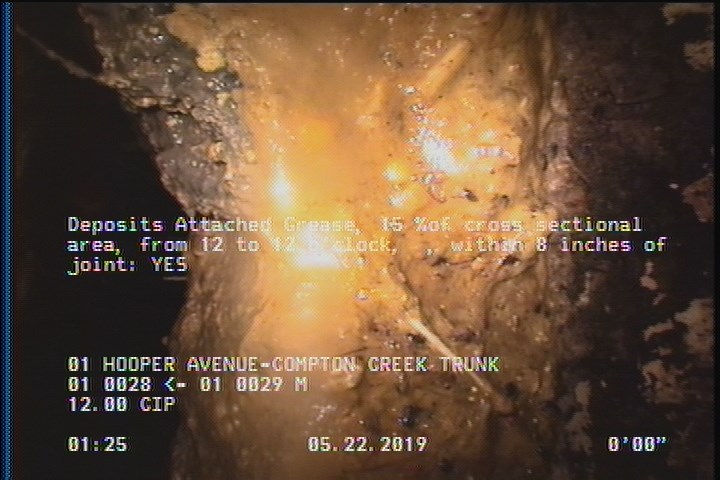 Deposits Attached Grease, 15 %of cross sectional area, from 12 to 12 o'clock, , within 8 inches of joint: YES