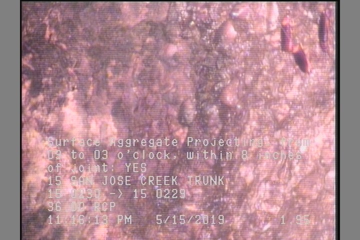 Surface Aggregate Projecting, from 09 to 03 o'clock, within 8 inches of joint: YES
