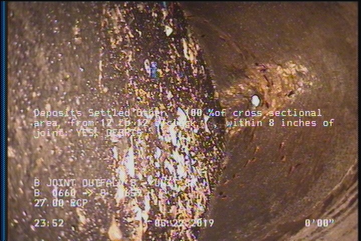 Deposits Settled Other, 100 %of cross sectional area, from 12 to 12 o'clock, , within 8 inches of joint: YES - DEBRIS