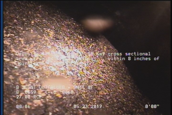 Deposits Settled Other, 50 %of cross sectional area, from 04 to 08 o'clock, , within 8 inches of joint: YES - DEBRIS