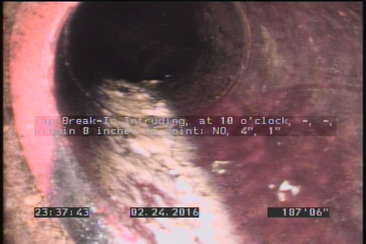 Tap Break-In Intruding, at 10 o'clock, -, -, within 8 inches of joint: NO, 4", 1"