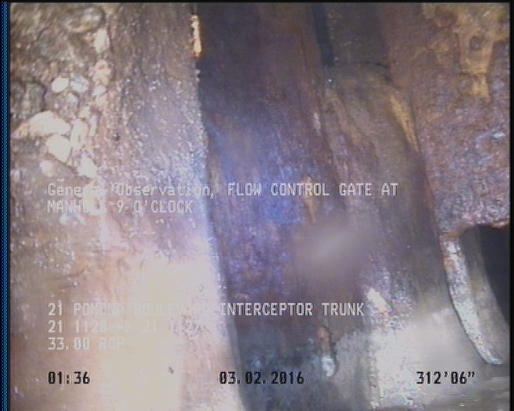 General Observation - FLOW CONTROL GATE AT MANHOLE 9 O'CLOCK