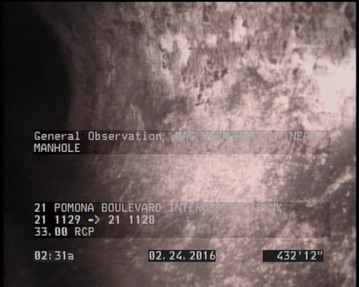 General Observation - MAG WORN HEAVILY NEAR MANHOLE