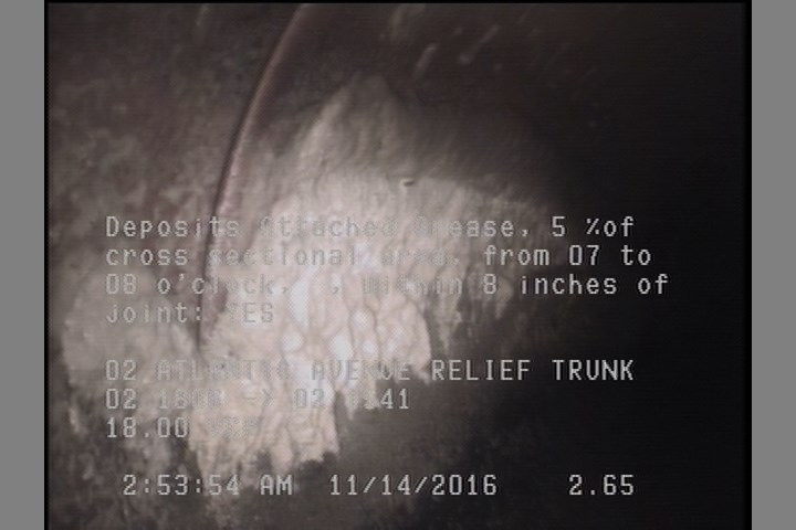 Deposits Attached Grease, 5 %of cross sectional area, from 07 to 08 o'clock, , within 8 inches of joint: YES
