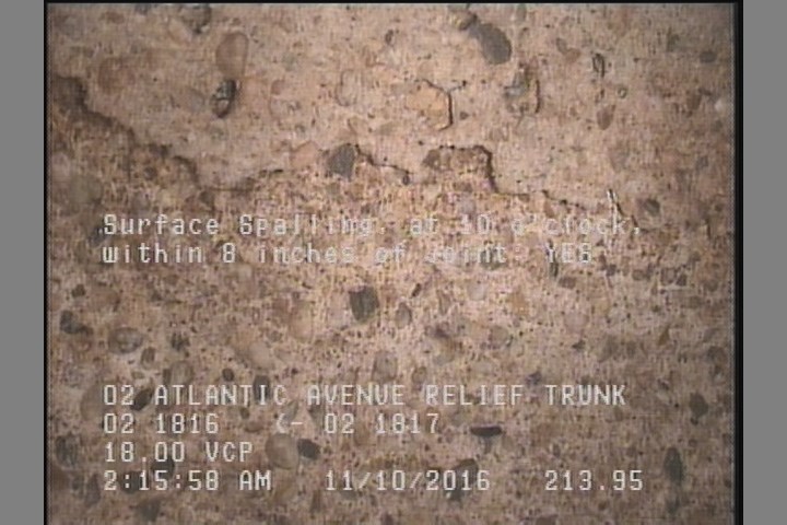 Surface Spalling, at 10 o'clock, within 8 inches of joint: YES