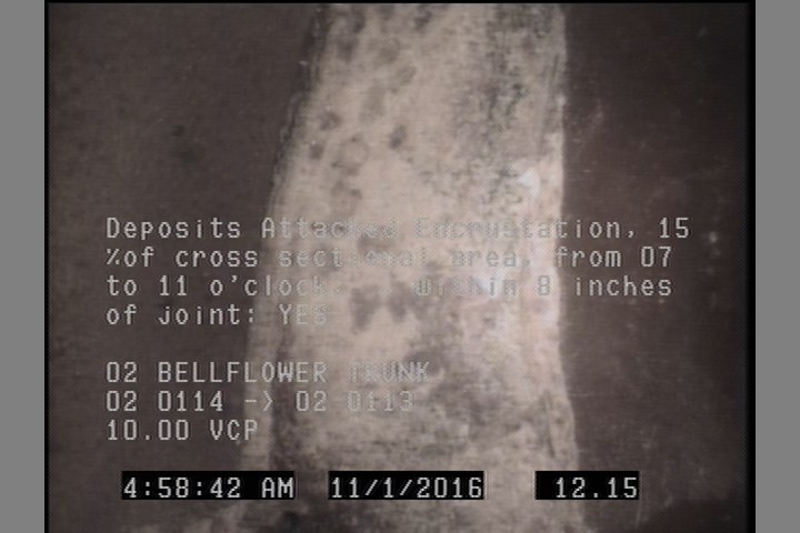 Deposits Attached Encrustation, 15 %of cross sectional area, from 07 to 11 o'clock, , within 8 inches of joint: YES