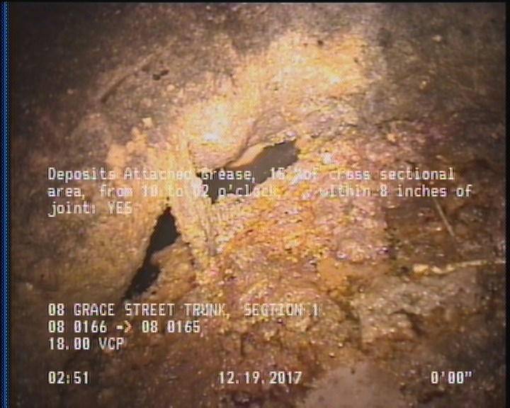 Deposits Attached Grease, 15 %of cross sectional area, from 10 to 02 o'clock, , within 8 inches of joint: YES
