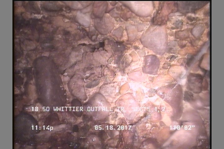 Hole, at 04 o'clock, within 8 inches of joint: NO
