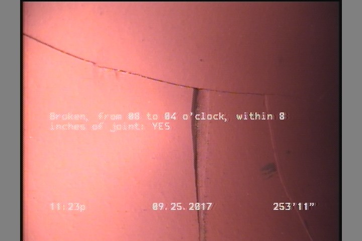 Broken, from 08 to 04 o'clock, within 8 inches of joint: YES