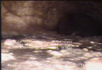 Deposits Settled Other, 40 %of cross sectional area, from 05 to 07 o'clock, , within 8 inches of joint: YES - DEBRIS