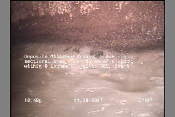 Deposits Attached Grease, 5 %of cross sectional area, from 05 to 07 o'clock, , within 8 inches of joint: YES, Start
