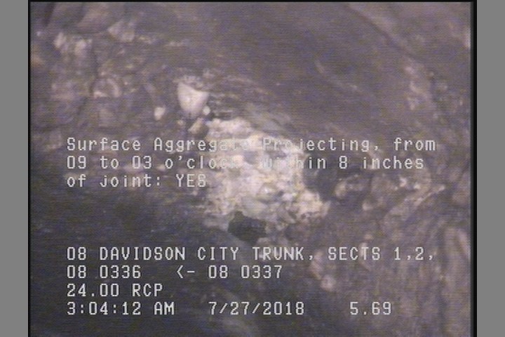 Surface Aggregate Projecting, from 09 to 03 o'clock, within 8 inches of joint: YES