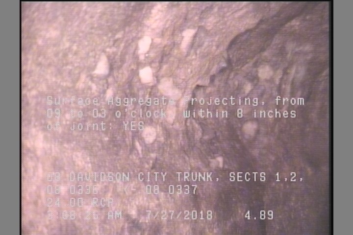 Surface Aggregate Projecting, from 09 to 03 o'clock, within 8 inches of joint: YES