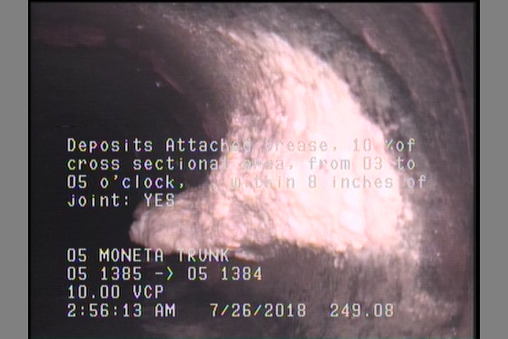 Deposits Attached Grease, 10 %of cross sectional area, from 03 to 05 o'clock, , within 8 inches of joint: YES