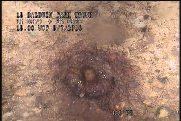 General Photograph - POSSIBLE SMALL HOLE OR INFILTRATION